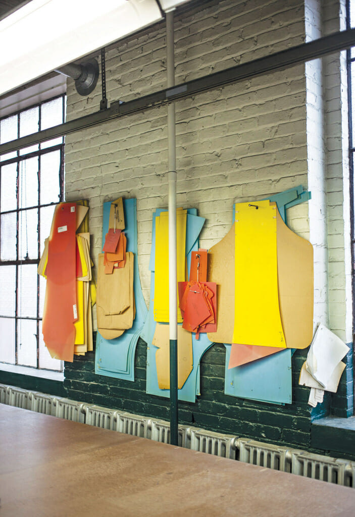 Colorful old patterns line the factory walls