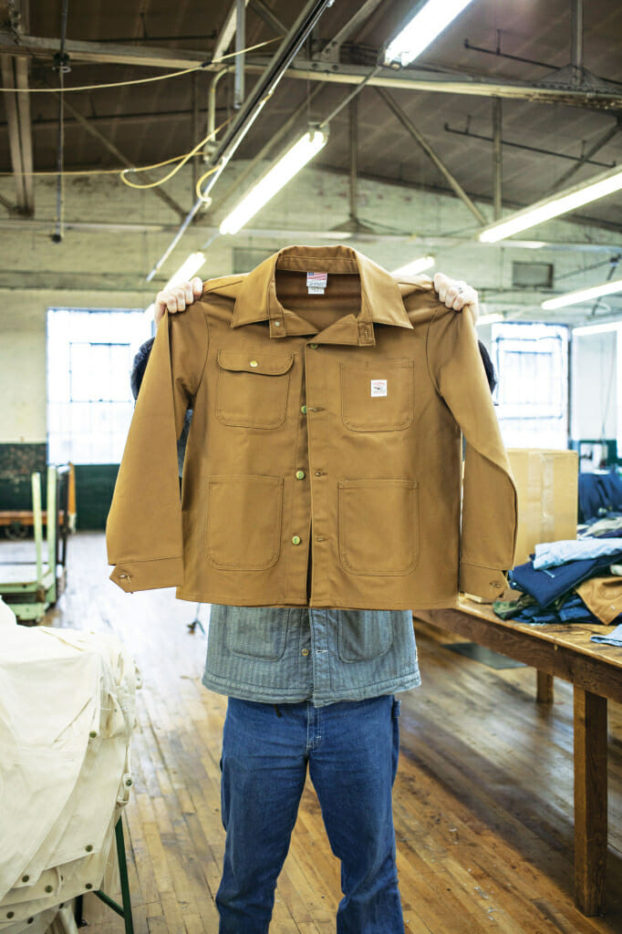 Lot 46 Brown Duck Chore Coat, one of their signature items.