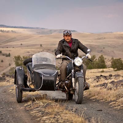John Mionczynski on his motorocycle with sidecar, sans goat.