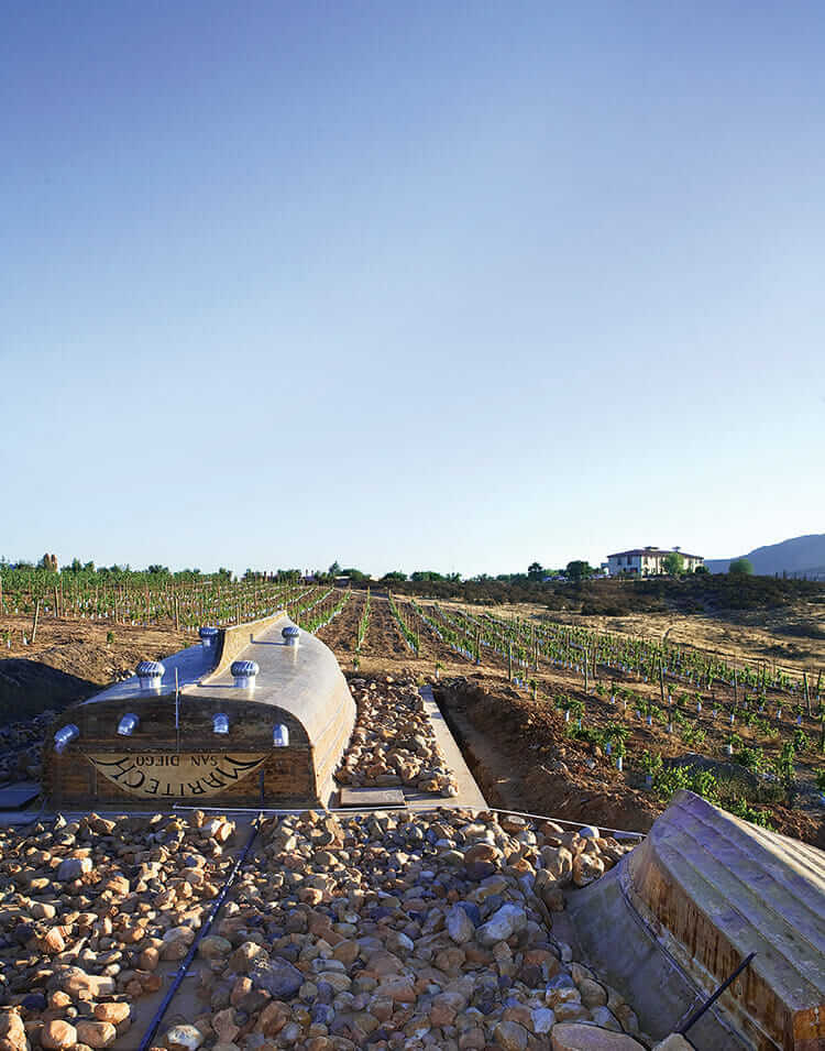 Boats serve as roofs for wine-tasting and aging rooms at La Villa del Valle.