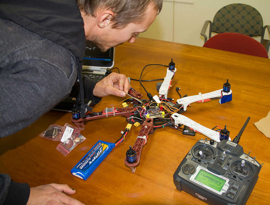 Matthew Wallhead points out the 'brain' of the drone.