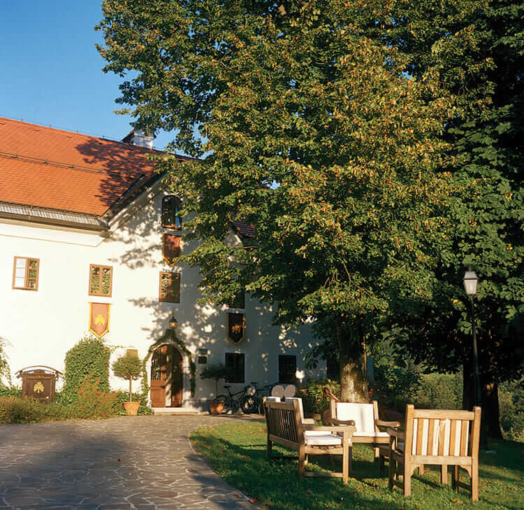 Outdoor seating in Kedov Dvorec's garden.