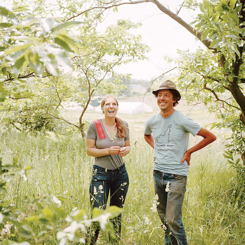 Jess Piskar and Abra Berens of Bare Knuckle Farm in their walnut grove.