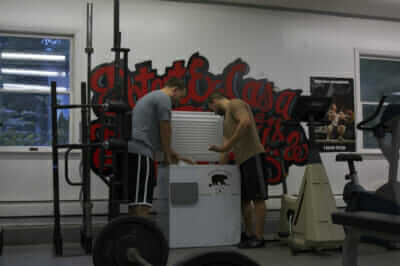 Members of CrossFit Woodshed shop for grass-fed meat.