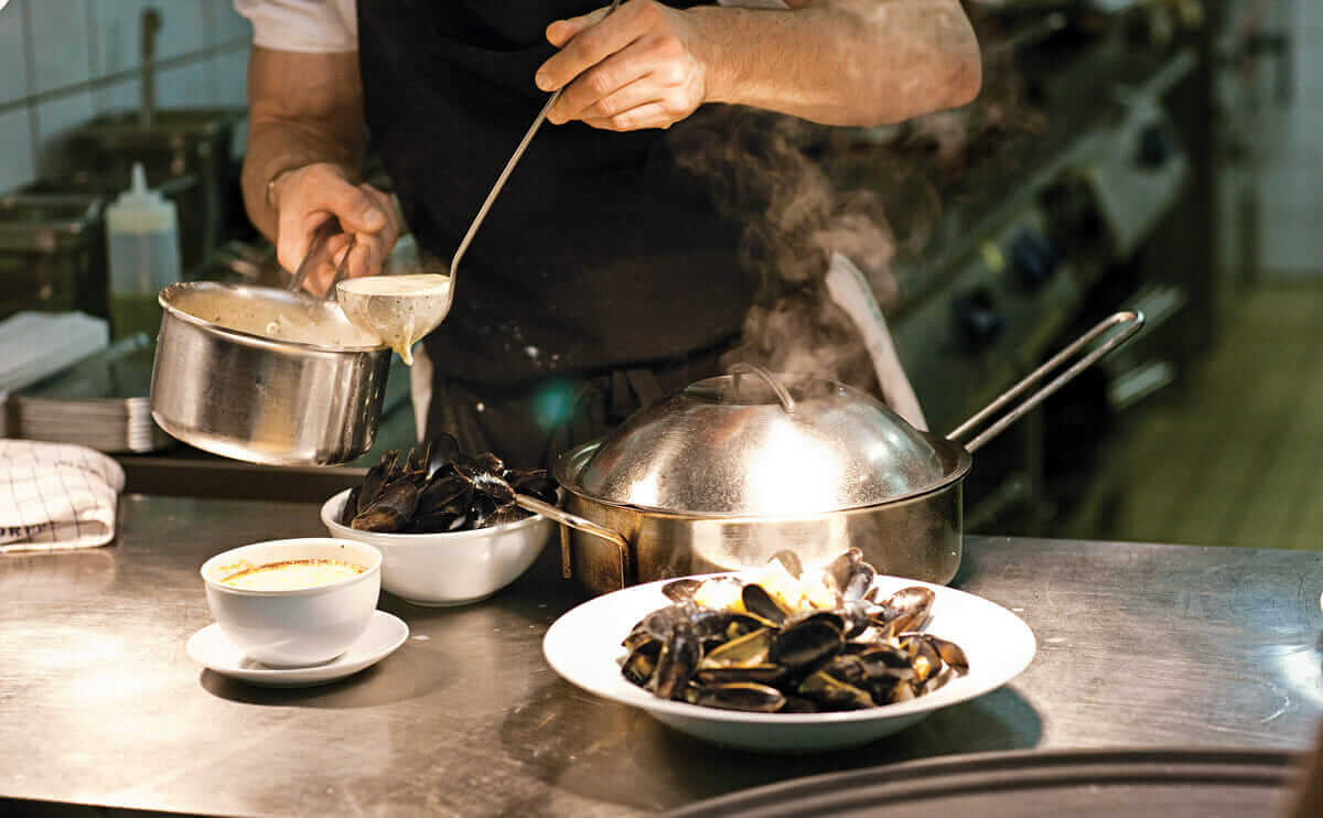 Food being prepared at Fiskebar.