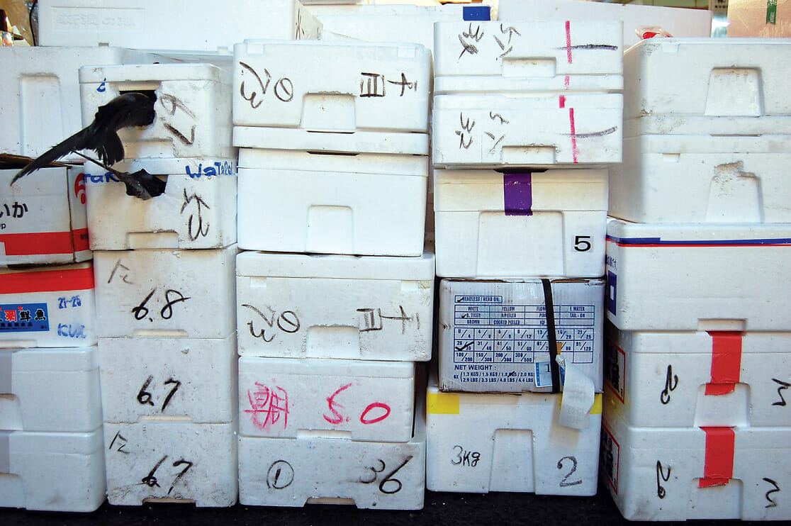 Fish 'coffins' (leak proof polystyrene boxes in which fish travel) at Tsukiji Market, Tokyo, Japan.