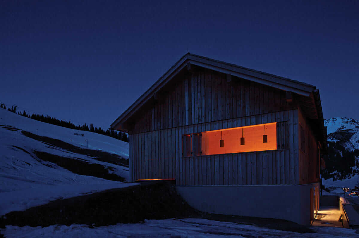 View of the porch at night. Even the summer winds can be chilly, so it is designed to insulate against the breeze.