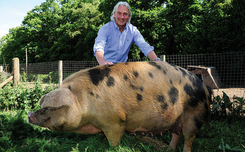 Robin Huston with a large porcine pal.