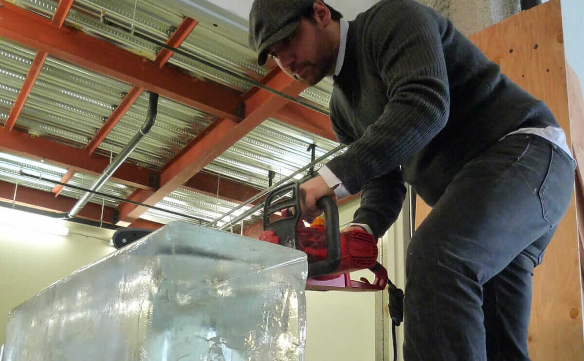 Bartender Zane Harris makes a cut on a 'Chainsaw Thursday' in 2010.