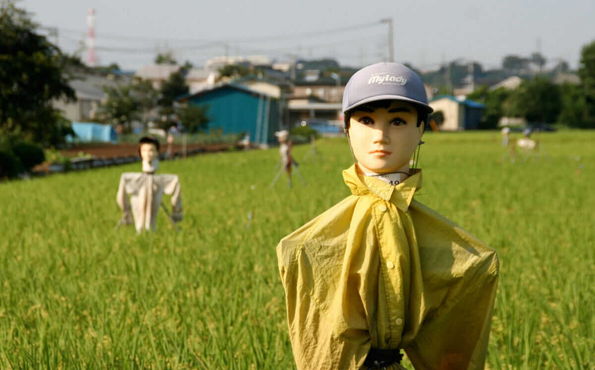 In Japan, many farmers use old dolls heads or mannequins when crafting their scarecrows. Via Flickr / Kazu Lekyoite.