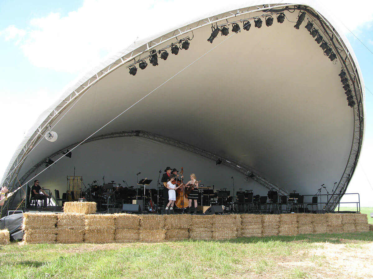 Musicians warm up in the amphitheater, which, like everything else at the site, would be returned to its natural state in the weeks following the event.