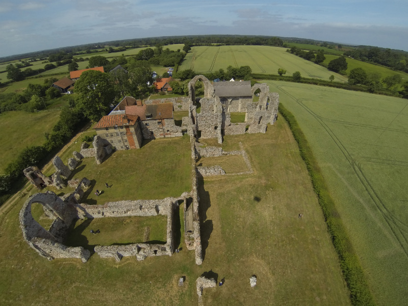 An aerial view of Leiston Abbey, showing a cropmark in the field adjacent to the ruin. / Courtesy Dig Ventures
