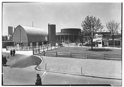 Visitors walk the grounds of the Electric Farm exhibit. / Courtesy Library of Congress Archives.