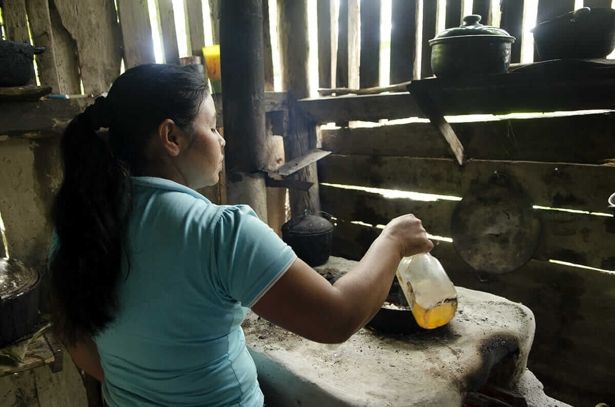 Mefalia Villarreyna cooks lunch for her family.