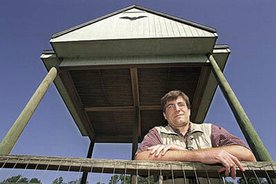 Mark Hostetler, standing in his 'bat house.'