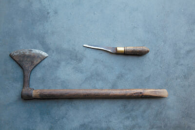 The traditional tools for cork harvesting.