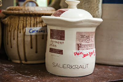 A crock of fermenting sauerkraut.