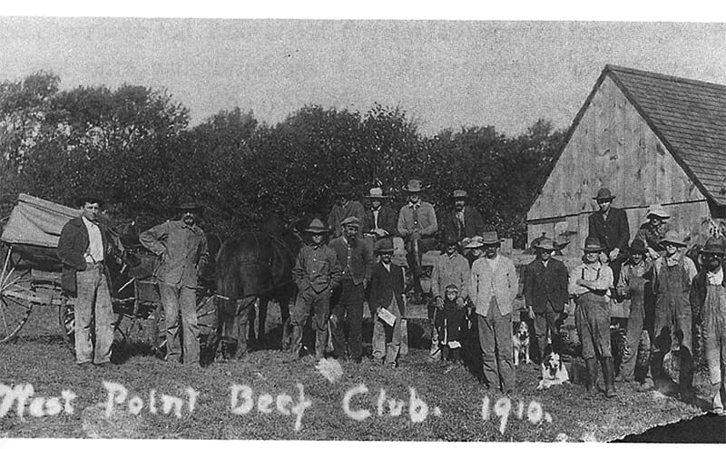 This photo, from 1910, shows men of the West Point Beef Club in Iowa. / Courtesy Evelyn Birkby; University of Iowa Press.