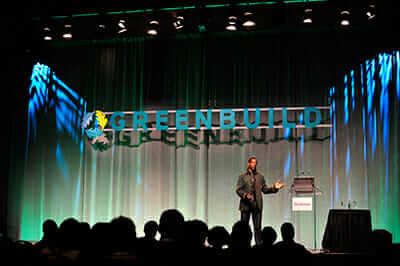 Ron Finley, L.A. gardener and fashion designer for athletes, speaks at one of Greenbuild's Master Series sessions. / Courtesy Greenbuild Expo.