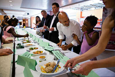 Judges, including Kass, score lunch recipes submitted by kids from around the country. / Courtesy the White House.