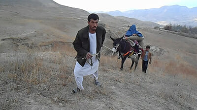Testing out the saddle in Afghanistan. / Courtesy HealthProm.