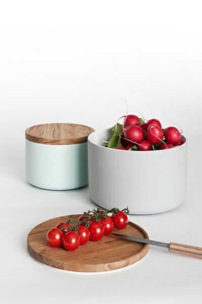 Multipurpose ceramic containers double as cutting boards.