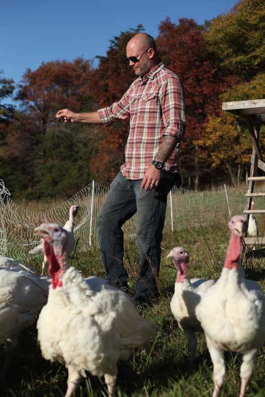 Charles Long with his free-range turkeys. 621 Studios