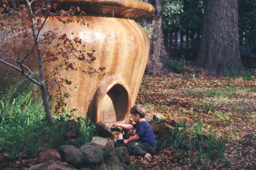 urn-shaped ferrocement tank.