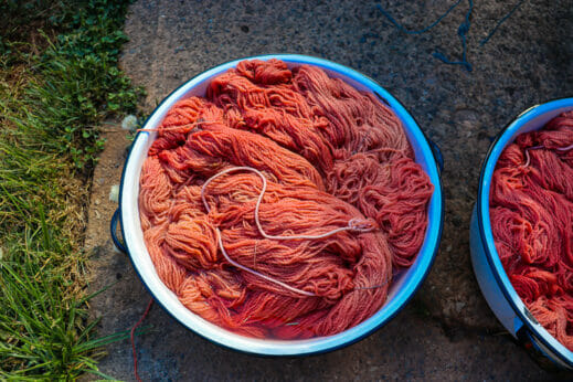 Yarn being dyed in bowls.